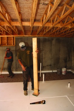 The level of the insulation was checked using a story pole and a laser level.