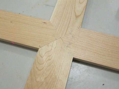The resulting four-way mitered joint, held together with Domino tenons, pocket screws, and yellow glue, was a strong connection.