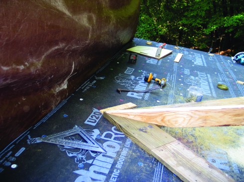 After the ridge is cut to the correct angle and length, it’s nailed into place.