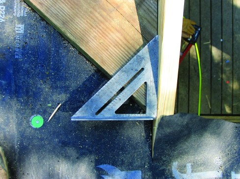 A rafter square determines the layout angle.