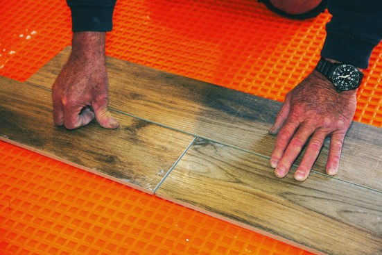 Slight warpage is inevitable with large tile and can cause excessive lippage where the edge of a tile sticks up above an adjacent one.