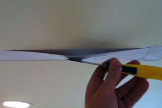 Use a putty knife to peel out tape joints that have failed.