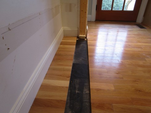 The track saw could not cut to the edge of the opening, so the author used a multi-tool to finish the job.