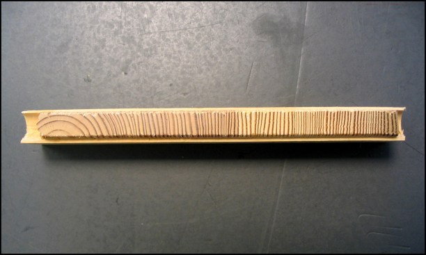 This sample of pitch pine, which is a northern hard pine similar to southern yellow pine, displays contrasting growth rings.