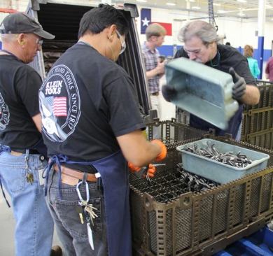 Machined parts enter the facility in plastic bins and are placed into individual slots in metal "baskets" prior to heat treating 
(
click here for video
). This insures every piece is exposed to the same amount of heat—which would not occur if they were dumped into the furnace in a pile.
