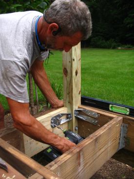 The new 4x4 guard posts were unnotched, and were attached to the framing using a combination of Simpson Strongtie DTT2Z connectors and the appropriate blocking detail for each location.