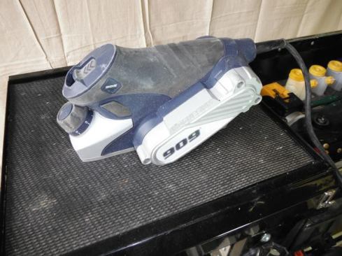 I saw this little 909 brand handheld electric planer (power block plane) one day and had to have it. It’s the only planer I have seen that is small enough to fit in the palm of my hand. If I need to scribe off more than an eighth of an inch I will use this planer to get close and then finish with another tool. I believe this tool is out of production but I have two extra sets of knives to hold me over. If I need to plane anything substantial, I will use my Bosch or Festool power planer.