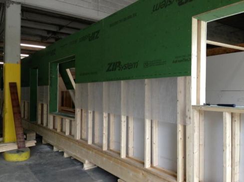 This photo supplied by Peter Schneider of Efficiency Vermont shows the double-stud wall assembly from the exterior viewpoint. Taped ZIP sheathing serves as the air pressure boundary for the structure, as well as the drainage plane.
