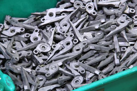 These plier jaws were forged at another facility and must be riveted to mating pieces, ground, polished, and otherwise processed before being attached to finished tools. Pliers are the central feature of most Leatherman tools. Why? Because Tim Leatherman (an engineer by training) came up with the idea for the multi-tool while traveling around Europe in a bomber Fiat in the 1970s; when things broke (and they often did) he repaired them with a Boy Scout knife and found himself wishing for a pair of pliers.