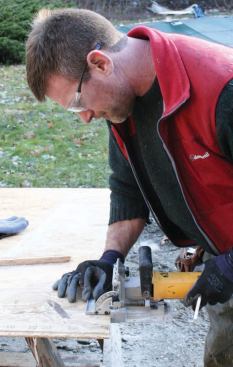 Before installing the AdvanTech sheathing, the carpenters cut slots for biscuit joints in the butt ends of the panels.