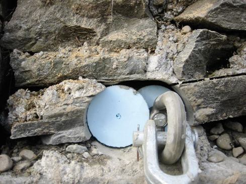 A foam plug prevented grout from leaking out of the 3-inch-diameter horizontal holes.