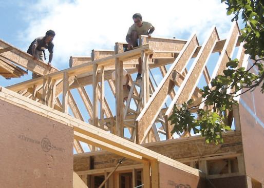 Note that the rafters' bottom plumb cuts are flush with the walls.