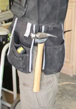 I like that there are hammer loops on each side of the vest. I’ll carry a hammer in one and clip the hook of my nail gun into the other so my hands are free to climb ladders.