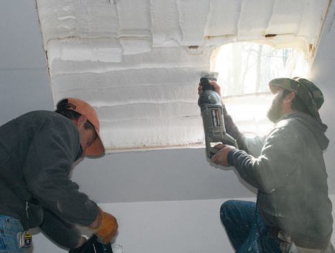 The bulk of the foam is removed with a recip saw.