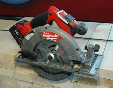 The M18 FUEL 7 1/4-inch saw (model 2731) is intended to replace a corded sidewinder. My favorite tool from the media event, this full-size 18-volt saw has a brushless motor and can cut through four sheets of OSB at a time—as fast as a corded sidewinder. The 9.0-pound unit bevels up to 50 degrees and has a hang hook, dust blower, and LED light. 
Click here to see it in action. Available: September 2014. Price: $229 (tool only).