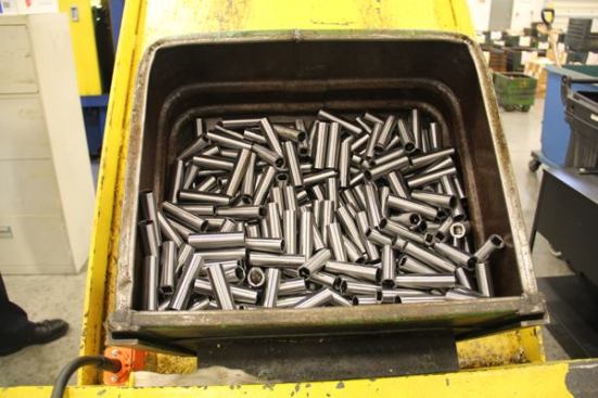 These 6 point sockets are at an intermediate point of processing. When the machining is complete they will be sent out for hardening and plating, and then returned to the plant for packaging and shipping.
