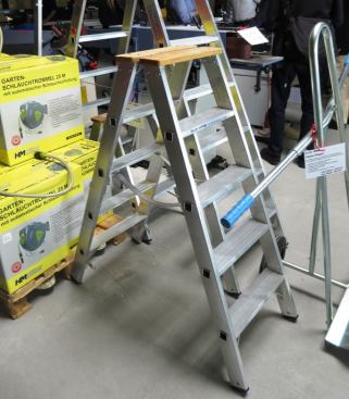 Check out this interesting aluminum ladder; it has a wood top and “fabric” straps to keep the legs from spreading too far.