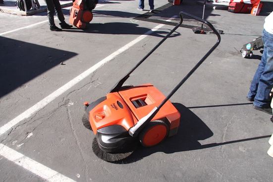 Haaga Sweepers were being demonstrated outside their booth. This model, the 477, is a manually-driven heavy-duty was picking up everything from dirt to water bottles. Larger battery powered sweepers were shown as well. They aren’t cheap (smaller models run about $330, and larger ones can go for as much as $1900, with variations in between), but they did a great job of cleaning up easily and efficiently.