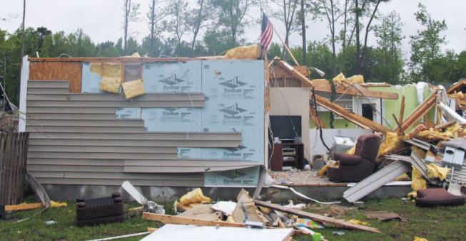 The homes I studied in Wilson were all built between 2004 and 2009. This home was almost completely destroyed; shown here is an end wall, which was braced at the corners with OSB and had nonstructural extruded polystyrene as infill sheathing.