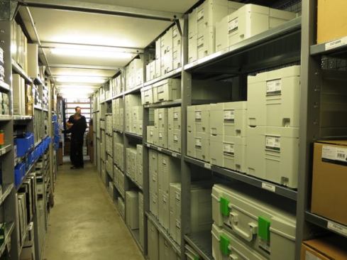 This is one of many aisles where parts and accessories are stored. Those shady looking characters in back are our own Michael Springer and Core 77’s Rain Noe.