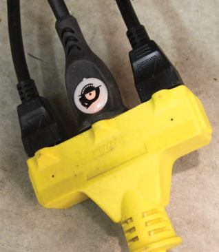 The lit plug on the Ridgid cord lets you see at a glance if there is power to the saw.