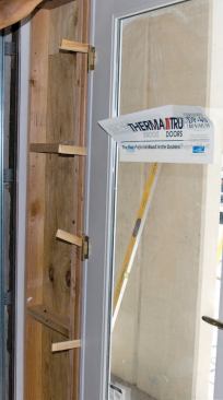 Shims are critical for door performance. They're needed behind every hinge and across the top jamb.