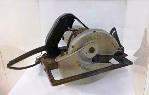 This 1953 aluminum circular saw has a built-in slip clutch to protect the motor and gears against overloading.