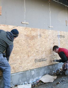 Since the panel ends were biscuited together, the panels didn't have to be trimmed to fit the stud layout.