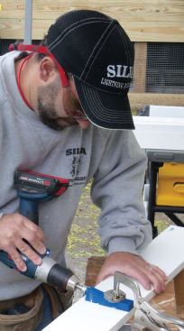 Assembling the Cap: These days I always use cellular PVC for exterior trim projects — primarily Kleer (kleerlumber.com), as that's the brand my lumberyard stocks. I always use pocket screws as well as PVC glue for fast, strong joints. I mount a Kreg bench clamp to my portable worktable and use a Kreg Mini jig to drill the holes.