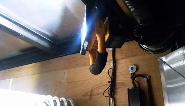 A battery-operated light at the rear the trailer provides light 24/7. It charges (and provides illumination) when the trailer is plugged in and runs on an internal battery when it is not. The light is from 
Flood-It.