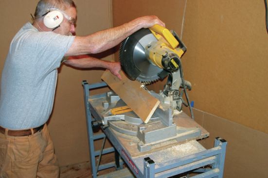 Cut through the base of the board to remove the strip you just cut
