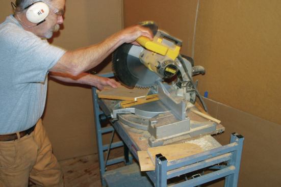 Angle the corner for your hand. You can make several cuts to curve it to your liking.