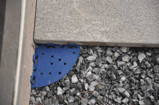 The plates consist of a 6-inch-diameter plate to set the pavers on and 1/8-inch stub-ups for spacing joints. They can be cut into halves or quarters as needed.