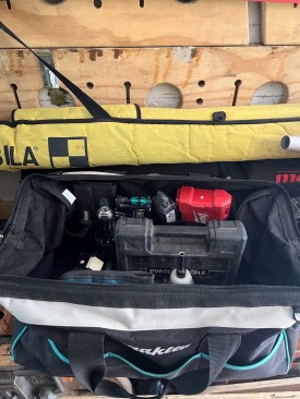 The author keeps some “empty capacity” in his truck. One example is an empty Makita tote he has filled with a selection of what he needs for the task at hand.