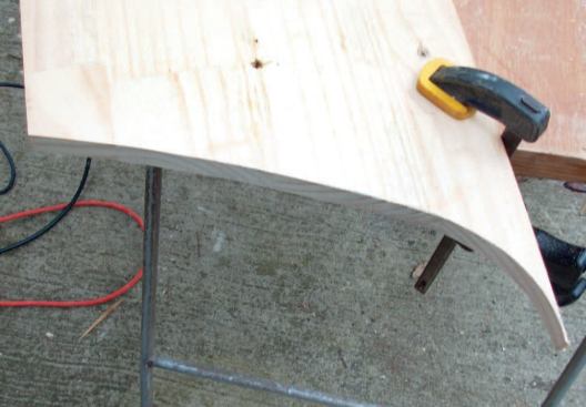 Make the Wood Router Template: I leave the edge of the pattern flat and perpendicular to the top. I now have a single pattern that I will use to make both the return and the tread. Ordinarily, if I were making several matching treads, I would use the router's template guide to make two patterns from this template — one for treads and one for returns — then use these patterns to make the parts with a flush-trim bearing bit. In this case, however, I had only one tread to make, so I used the pine template to make both the tread and the return.