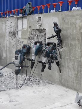 Bosch breakers and rotary hammers during a rare moment of rest at the show. Most of the time someone was hammering or drilling away with them on the concrete wall behind.