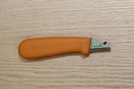 The Electrician’s Knife (ELK) is designed for stripping wire and cable. The small blade on the top is for slicing the outer casing; the main blade for stripping the wires. I found this knife useful in carpentry as well for carving small reliefs on trim, cleaning up copes, and fine tuning scribes. It’s great for whittling pencils.