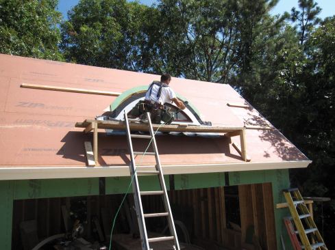 The window trim layer was then nailed into place.