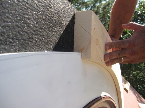 A rabbet routed in the lower edge of the subfascia allows it to lap over the window trim.