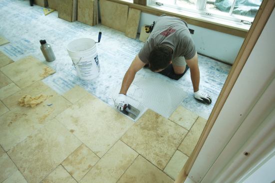 The mortar was spread with a 1/4-by-3/8-inch notched trowel.