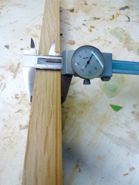 Once the desired thickness is achieved, the best side of the board will be marked with chalk.