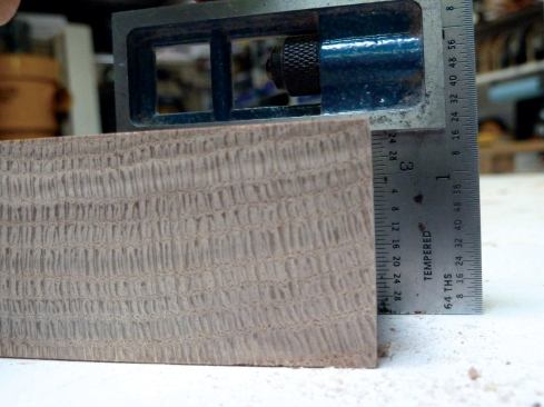 The now-smooth ripped edge is 90 degrees to the flattened face and can be run against the table saw's fence.