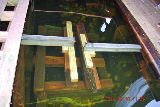 Solid blocking replaced shims to carry the load over the coming winter.
