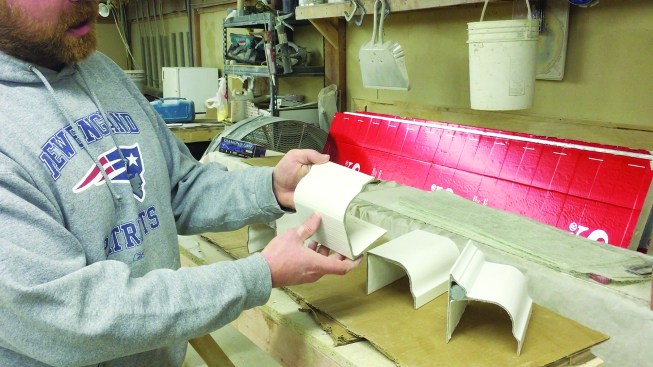 The production manager, Tom Moore, showed me around and explained that the factory made four standard profiles molded from traditional 4x5 and 4x6 wood gutters.