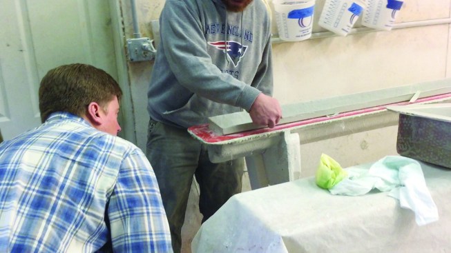 I was given a quick tour of the manufacturing room, where he demonstrated how the finished gutters were released from the molds.