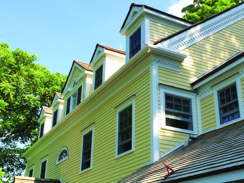 At returns, we had to fiberglass the mitered seams in place, working off ladders.