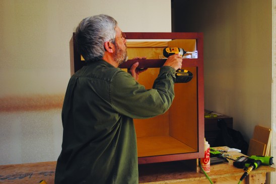 The mating drawer hardware screws into the cabinets, as well.
