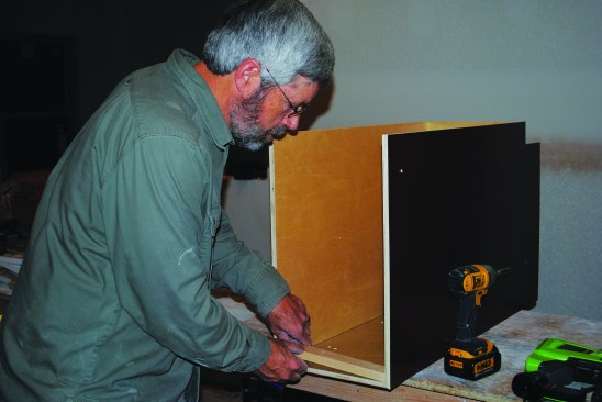 The author adds a cleat (not included in the parts kit) to strengthen the back for installation.