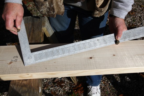 The easiest and fastest way to layout the angles for the hip rafter is with stair gauges, small hexagonal devices that clamp onto the edge of a framing square.The roof in the photos is 6:12 pitch, so the hip rafter is calculated at a 6:17 pitch.