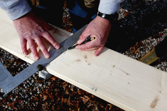 Holding a pencil at the HAP distance on the square, slide the square up until the HAP distance meets the length line. This intersecting point is the top outside edge of the plates.
